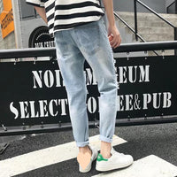 Wide-hole jeans men's nine-inch pants