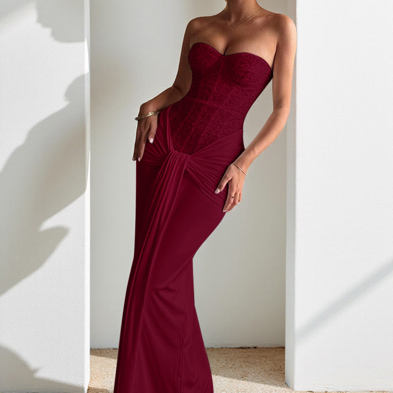 Evening dress with a long skirt that cinches at the waist to show off a slender figure