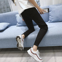 Wide-hole jeans men's nine-inch pants